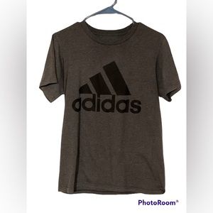 Woman’s gray Adidas Tee